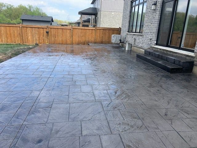 Sealed exposed aggregate concrete driveway by TriCity Concrete Sealing in Stratford, Ontario